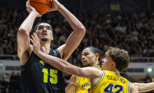 Zach Edey of the Purdue Boilermakers shoots the ball against Will Tschetter of the Michigan Wolverines during the second half at Mackey Arena on January 23, 2024, in West Lafayette, Indiana.