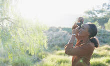 Women taking a photo outside