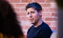 Sam Altman smiling during an interview at Bloomberg House on the opening day of the World Economic Forum (WEF)