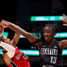 Ezi Magbegor #13 of the Seattle Storm blocks the shot of Natasha Cloud #9 of the Washington Mystics 