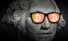 A close up of George Washington, on the U.S. dollar bill, wearing sunglasses with the Bitcoin logo superimposed over the lenses. 