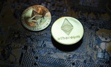 two physical coins marked with the Ethereum logo