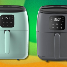 Two air fryers on green and yellow background