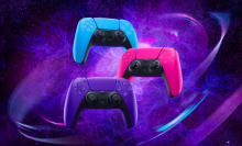 playstation's three new dualsense wireless controllers on a purple cosmic background