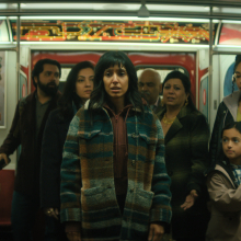 A family stands in a subway car in the TV show "The Umbrella Academy."