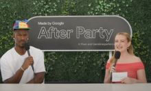 Jimmy Butler and Amelia Dimoldenberg in front of a sign that reads "After Party."