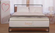 Amore Natural Hybrid Mattress (Queen) in a bedroom.