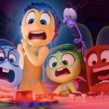 The emotions from "Inside Out 2" scream while looking at a flashing red button.