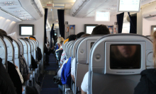 airplane waiting for take off from the perspective of an aisle seat