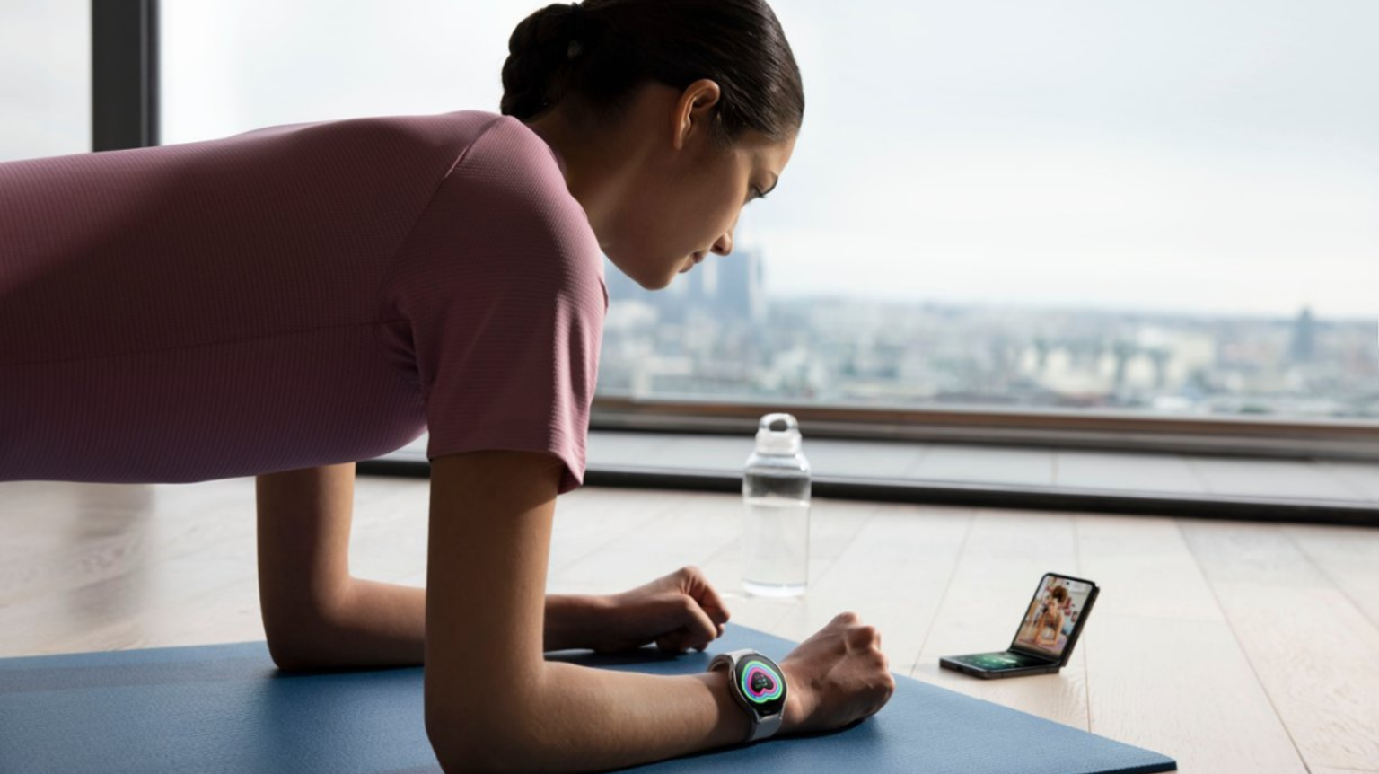 woman in a plank position wearing Samsung Galaxy Watch 6