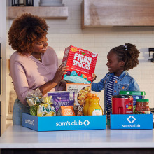 Mother and Daughter unpacking groceries