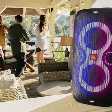 JBL PartyBox 110 sits outside 