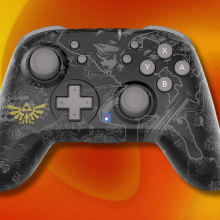 'The Legend of Zelda' Hori Wireless Nintendo Switch Pro Controller on abstract orange background