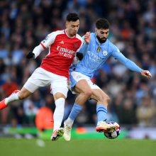 Josko Gvardiol of Manchester City is challenged by Gabriel Martinelli