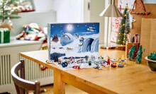 a star wars lego advent calendar sits on a table with holiday decorations