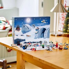 a star wars lego advent calendar sits on a table with holiday decorations