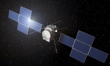 An artist's conception of the European Space Agency's Juice spacecraft flying through space.