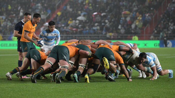 Australia's Wallabies scrum-half Jake Gordon puts the ball into the scrum