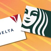 a delta gift card and a starbucks gift card on a orange streaky background