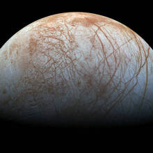 The cracked ice shell of Jupiter's moon Europa.