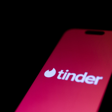 tinder logo on phone