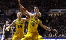 Michigan Wolverines forward Olivier Nkamhoua blocks out Purdue Boilermakers center Zach Edey during a men's college basketball game between the Michigan Wolverines and the Purdue Boilermakers on January 23, 2024, at Mackey Arena in West Lafayette, Indiana..