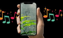 iPhone showing rain on the screen with music notes in the background