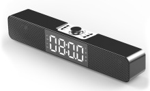 Black soundbar speaker with 08:00 in LED lights.