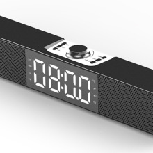 Black soundbar speaker with 08:00 in LED lights.