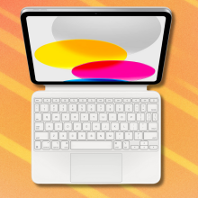 Apple Magic Keyboard Folio on orange abstract background