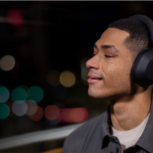 man listening to music with sony wh-1000xm5 headphones