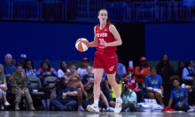 Caitlin Clark of the Indiana Fever brings the ball up court