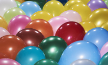 Close-up of lots of different coloured balloons