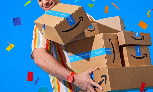 a man holding amazon boxes against a blue background filled with confetti