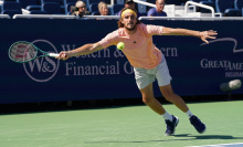 Stefanos Tsitsipas of Greece attempts to play a forehand