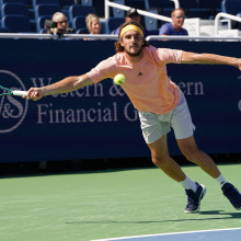 Stefanos Tsitsipas of Greece attempts to play a forehand