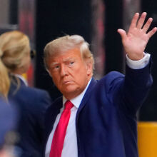 Donald Trump waving at trump tower