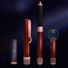 Dyson hair tools on dark background