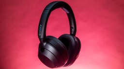 black Sony ULT wear headphones on a red background