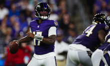 Josh Johnson of the Baltimore Ravens looks to pass