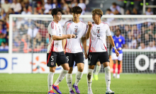 Japan players celebrate