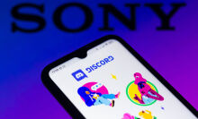 Discord app on phone in front of Sony logo