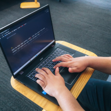 Mashable's Alex Perry using the Acer Chromebook Plus 516 GE