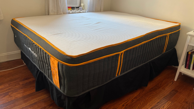 tall mattress with spots of copper on the surface