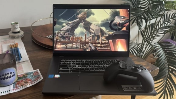 the Acer Chromebook 516 GE with an xbox controller on it sitting on a kitchen table