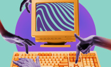 Human hands typing on vintage computer against mint background