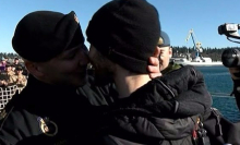 This same-sex military couple's reunion kiss just made history