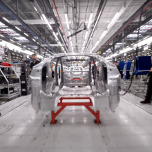 A flying view of a Tesla Gigafactory assembly line. 