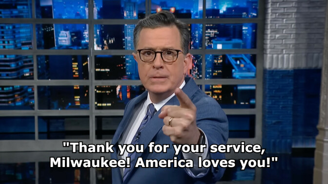 Stephen Colbert on 'The Late Show with Stephen Colbert.' Text on the image reads: "Thank you for your service, Milwaukee! America loves you!"