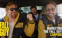 Three men in Letterman jackets that say "The Fall Guy" driving in a car.
